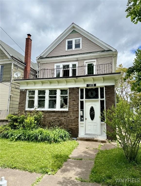 711 W Ave, Buffalo, NY 14213 - view of front of property featuring a balcony and brick siding