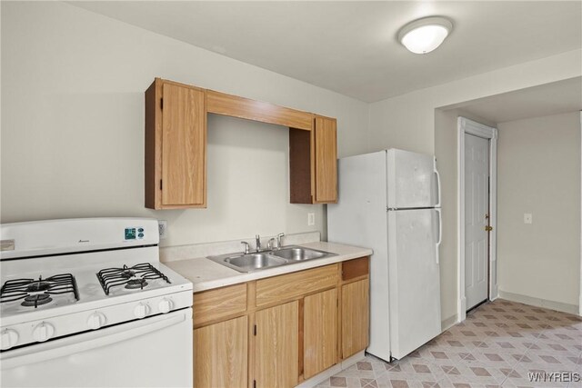 89 Pine St, Lockport-City, NY 14094 - kitchen with white appliances, a sink, and light countertops