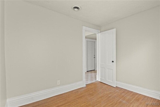 89 Pine St, Lockport-City, NY 14094 - empty room featuring light wood-style flooring and baseboards