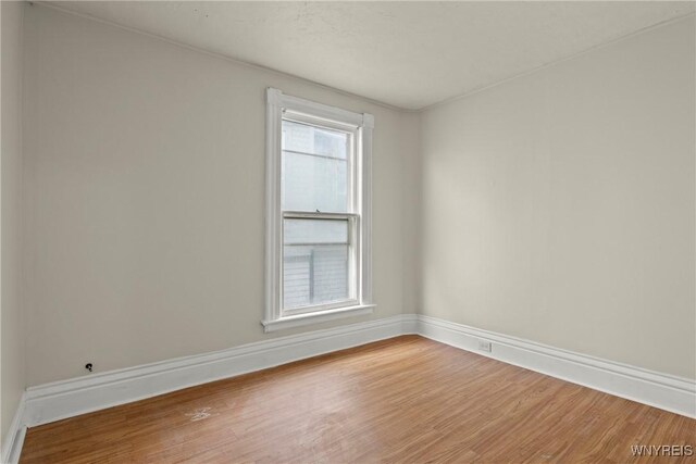89 Pine St, Lockport-City, NY 14094 - unfurnished room with light wood-style floors and baseboards