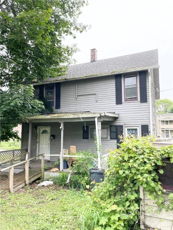 207-209-2091/2 W Chemung Pl, Elmira-City, NY 14904 - view of front of property featuring a chimney and covered porch