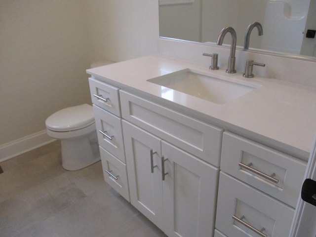 6 Royal Ct, Horseheads, NY 14845 - bathroom with vanity, toilet, baseboards, and tile patterned flooring