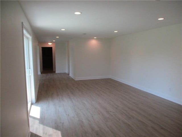 6 Royal Ct, Horseheads, NY 14845 - empty room featuring wood finished floors, recessed lighting, and baseboards