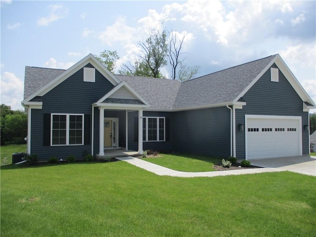 6 Royal Ct, Horseheads, NY 14845 - view of front facade with roof with shingles, an attached garage, a front yard, and driveway