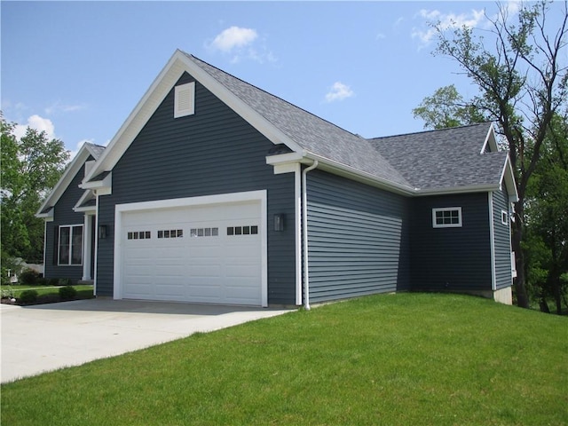 6 Royal Ct, Horseheads, NY 14845 - view of side of home with an attached garage, concrete driveway, a shingled roof, and a lawn