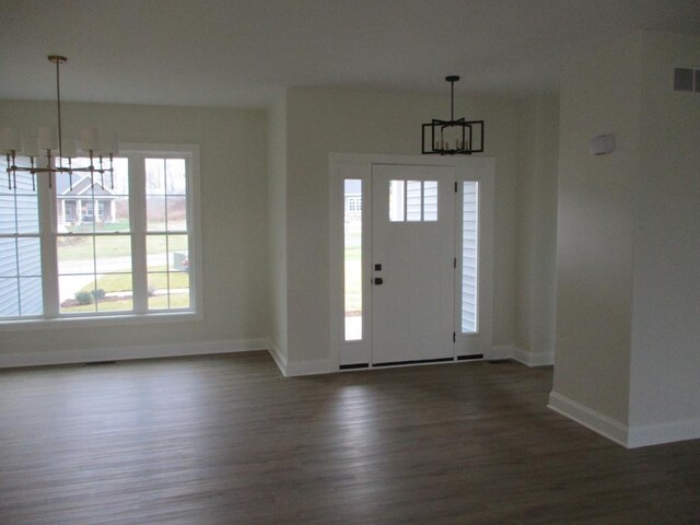 6 Royal Ct, Horseheads, NY 14845 - foyer featuring a chandelier, wood finished floors, and baseboards