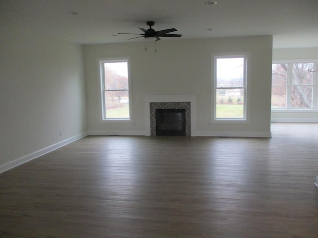 6 Royal Ct, Horseheads, NY 14845 - unfurnished living room featuring baseboards, wood finished floors, a fireplace, and a ceiling fan