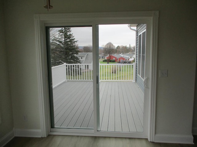 6 Royal Ct, Horseheads, NY 14845 - doorway to outside with baseboards, plenty of natural light, and wood finished floors