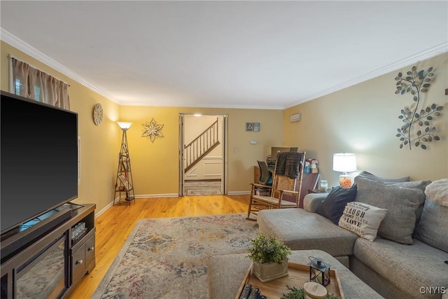 223 Windcrest Dr, Camillus, NY 13031 - living area with stairs, ornamental molding, and light wood-style flooring