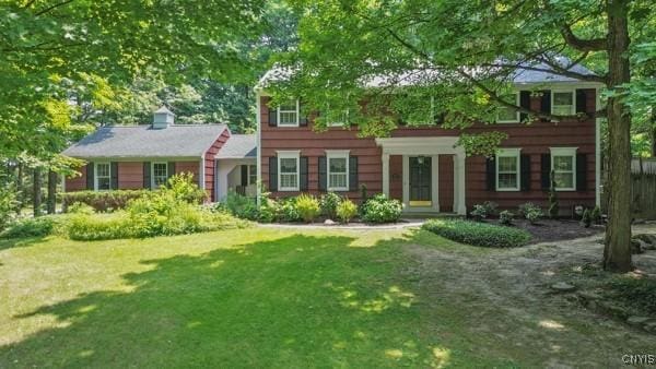223 Windcrest Dr, Camillus, NY 13031 - colonial house with a front yard