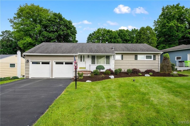 123 Hillcrest Rd, Onondaga, NY 13219 - ranch-style house with an attached garage, asphalt driveway, and a front lawn