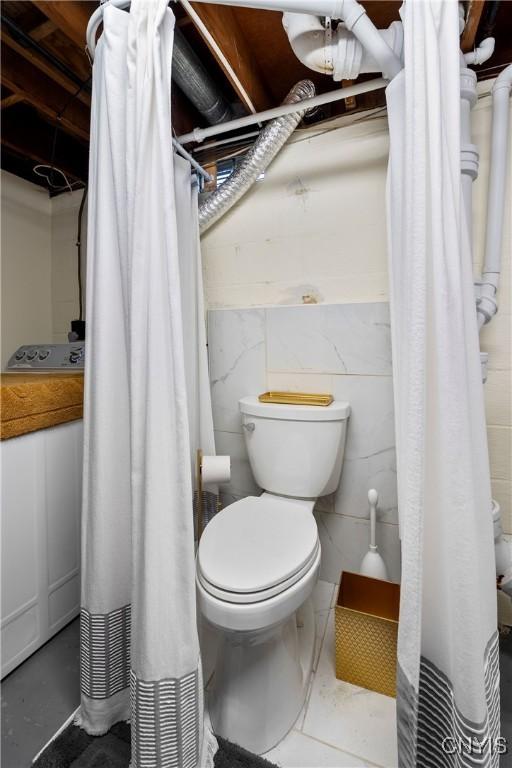 123 Hillcrest Rd, Onondaga, NY 13219 - full bathroom with toilet and tile walls
