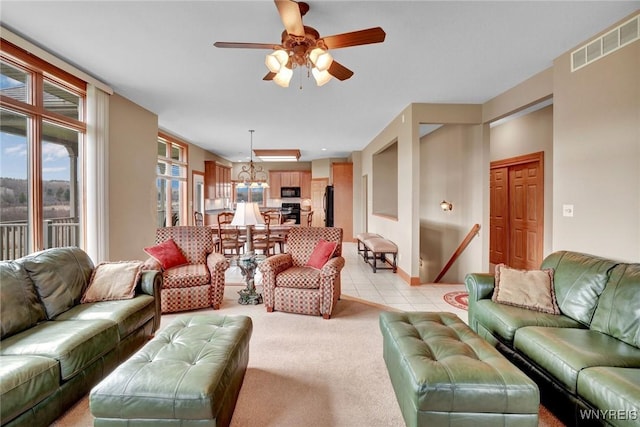 8770 Old State Rd, Allen, NY 14709 - living area featuring a ceiling fan, light colored carpet, and light tile patterned floors