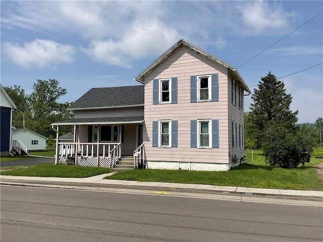 201 S Main St, Wayland, NY 14572 - traditional-style house with covered porch and a front lawn