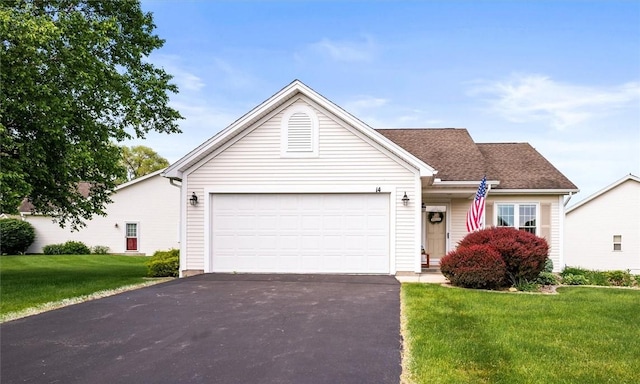 14 Glenn Hvn, Ogden, NY 14559 - view of front of house featuring driveway, an attached garage, and a front yard