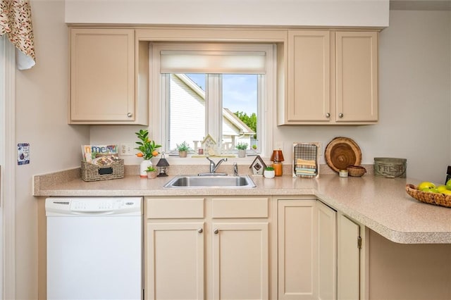 14 Glenn Hvn, Ogden, NY 14559 - kitchen with dishwasher, a sink, light countertops, and cream cabinets
