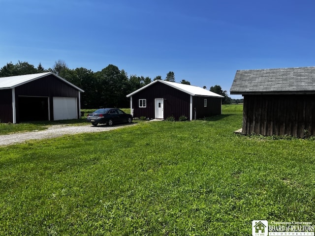 1727 Rte 426, French Creek, NY 14724 - view of grassy yard with a pole building, a garage, and an outdoor structure