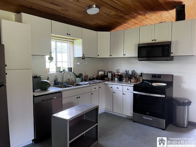 1727 Rte 426, French Creek, NY 14724 - kitchen featuring appliances with stainless steel finishes, a sink, wooden ceiling, finished concrete floors, and white cabinetry