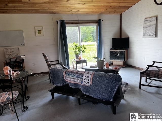 1727 Rte 426, French Creek, NY 14724 - living room featuring wooden ceiling, finished concrete flooring, wooden walls, and lofted ceiling