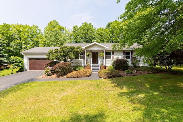 26 Prospect St, Delhi, NY 13753 - single story home featuring driveway, covered porch, a garage, and a front lawn