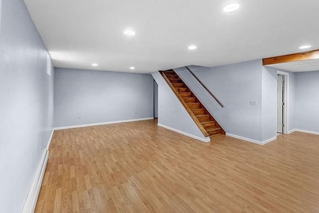26 Prospect St, Delhi, NY 13753 - finished basement featuring light wood-style floors, baseboard heating, recessed lighting, baseboards, and stairs