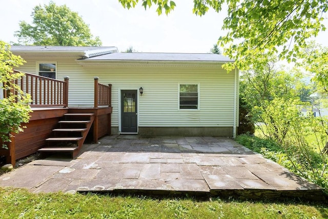 26 Prospect St, Delhi, NY 13753 - rear view of house featuring a deck, a patio area, and stairway