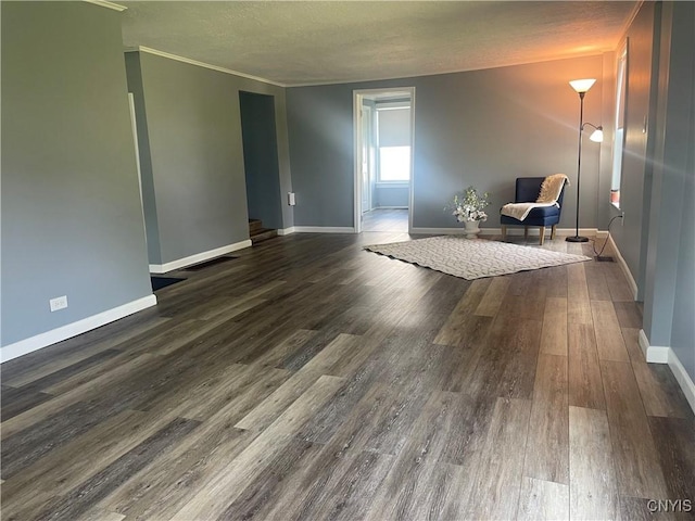 8807 N Main St, Le Ray, NY 13637 - unfurnished room featuring baseboards, dark wood finished floors, and a textured ceiling
