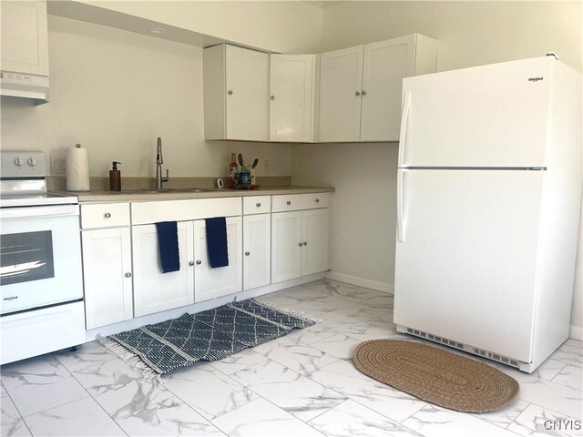 8807 N Main St, Le Ray, NY 13637 - kitchen with white appliances, light marble finish floors, a sink, under cabinet range hood, and white cabinetry