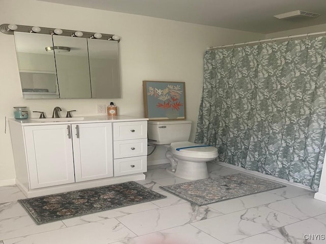 8807 N Main St, Le Ray, NY 13637 - bathroom featuring marble look tiles, baseboards, toilet, vanity, and curtained shower