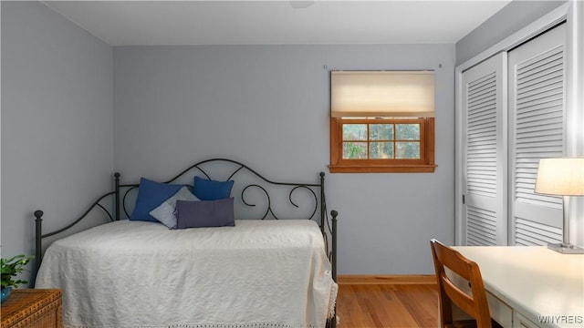43 Larned Ln, Orchard Park, NY 14127 - bedroom with a closet and wood finished floors