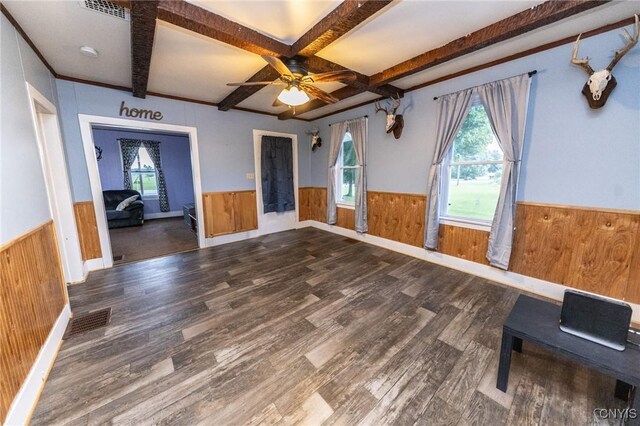 7750 State Route 812, New Bremen, NY 13367 - spare room with wainscoting, wood finished floors, wooden walls, ceiling fan, and beamed ceiling