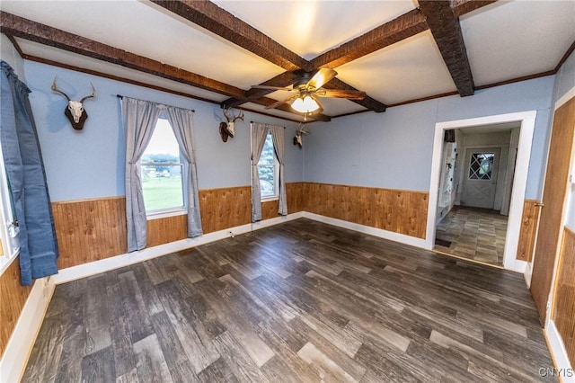 7750 State Route 812, New Bremen, NY 13367 - spare room featuring wainscoting, wooden walls, wood finished floors, and a ceiling fan