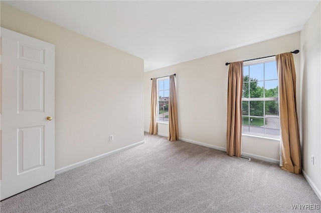 9377 Juniper Pl, Clarence, NY 14032 - carpeted spare room featuring baseboards