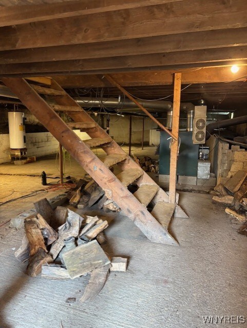 7491 S Grove Rd, Lyndon, NY 14737 - below grade area featuring gas water heater and heating unit