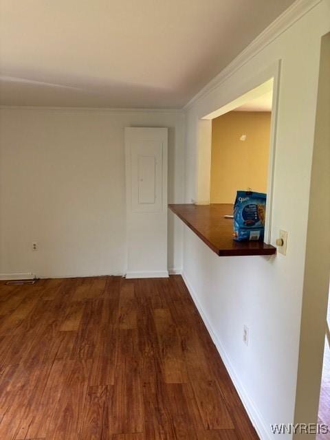 7491 S Grove Rd, Lyndon, NY 14737 - hallway with wood finished floors and ornamental molding
