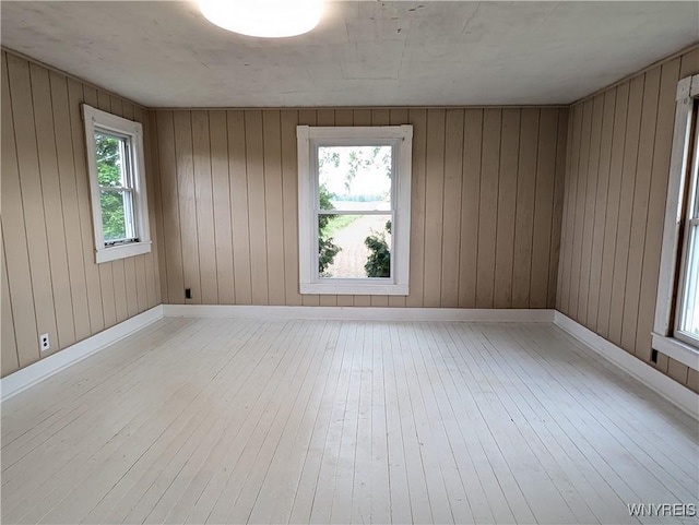 11131 Lakeshore Rd, Yates, NY 14098 - empty room featuring healthy amount of natural light and light wood finished floors