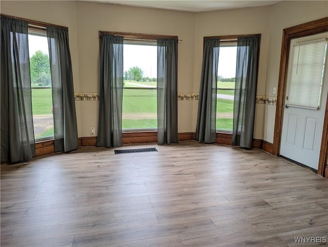 11131 Lakeshore Rd, Yates, NY 14098 - doorway to outside with wood finished floors