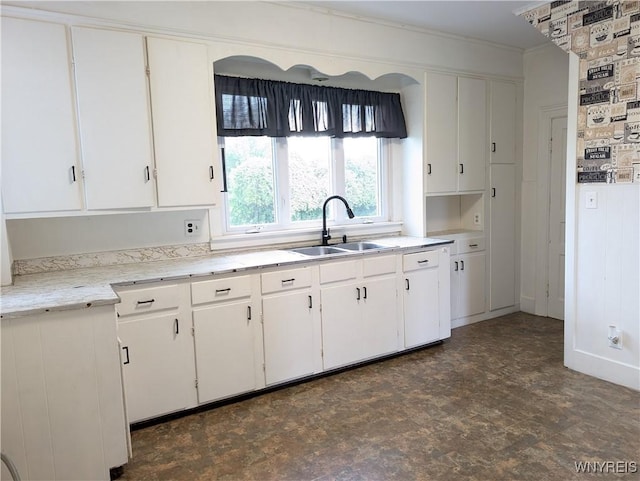 11131 Lakeshore Rd, Yates, NY 14098 - kitchen featuring a sink, white cabinets, and crown molding