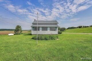 3271 Rte 78, Wethersfield, NY 14024 - rear view of property featuring a lawn