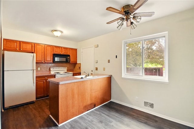 116 Surrey Hill Way, Henrietta, NY 14623 - kitchen with white appliances, a peninsula, ceiling fan, brown cabinetry, and baseboards