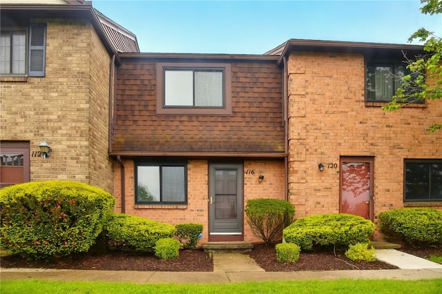 116 Surrey Hill Way, Henrietta, NY 14623 - view of front of house featuring brick siding and a shingled roof