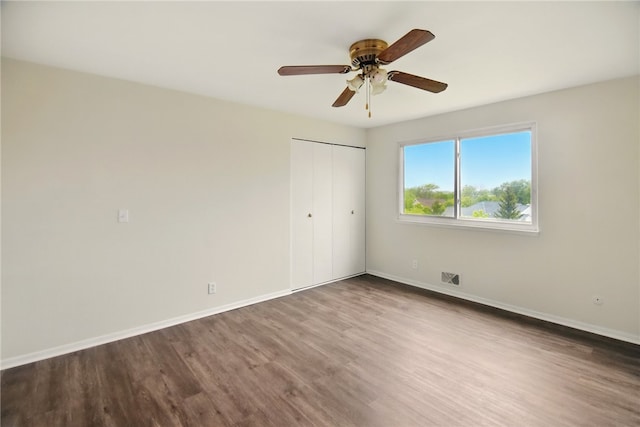 116 Surrey Hill Way, Henrietta, NY 14623 - unfurnished bedroom with wood finished floors, baseboards, a closet, and ceiling fan