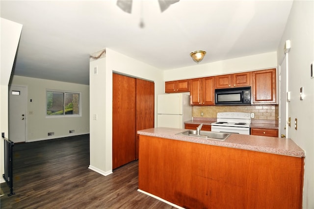 116 Surrey Hill Way, Henrietta, NY 14623 - kitchen featuring white appliances, a sink, decorative backsplash, brown cabinets, and dark wood-type flooring