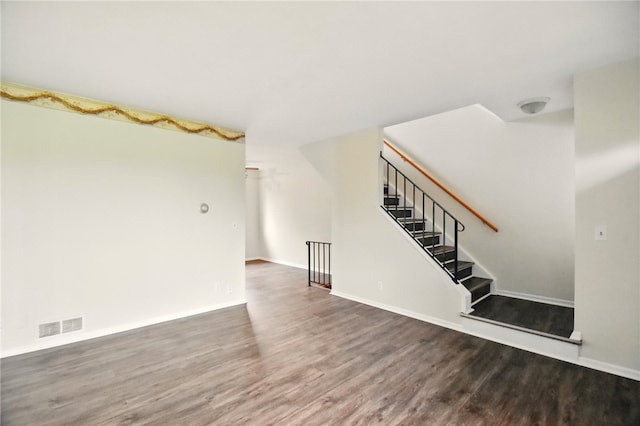 116 Surrey Hill Way, Henrietta, NY 14623 - unfurnished living room with wood finished floors, baseboards, and stairs