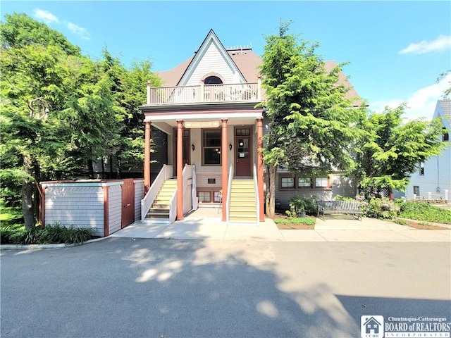 35 Miller Park, Chautauqua, NY 14722 - view of front facade with a balcony and stairway