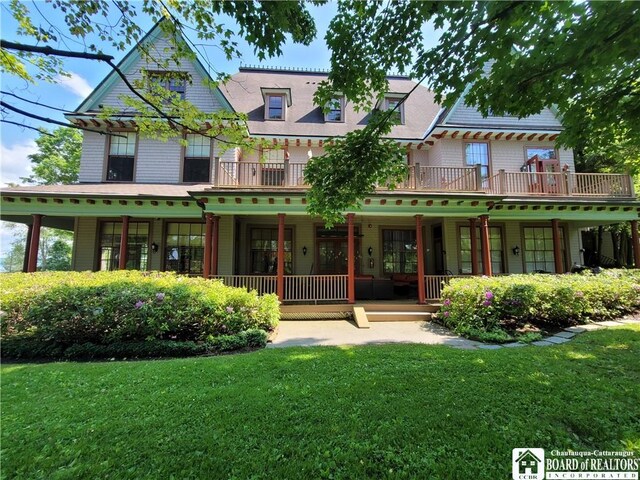 35 Miller Park, Chautauqua, NY 14722 - rear view of house with a yard and a porch