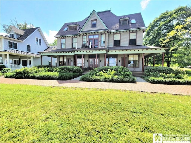 35 Miller Park, Chautauqua, NY 14722 - view of front of house with a front lawn and a porch