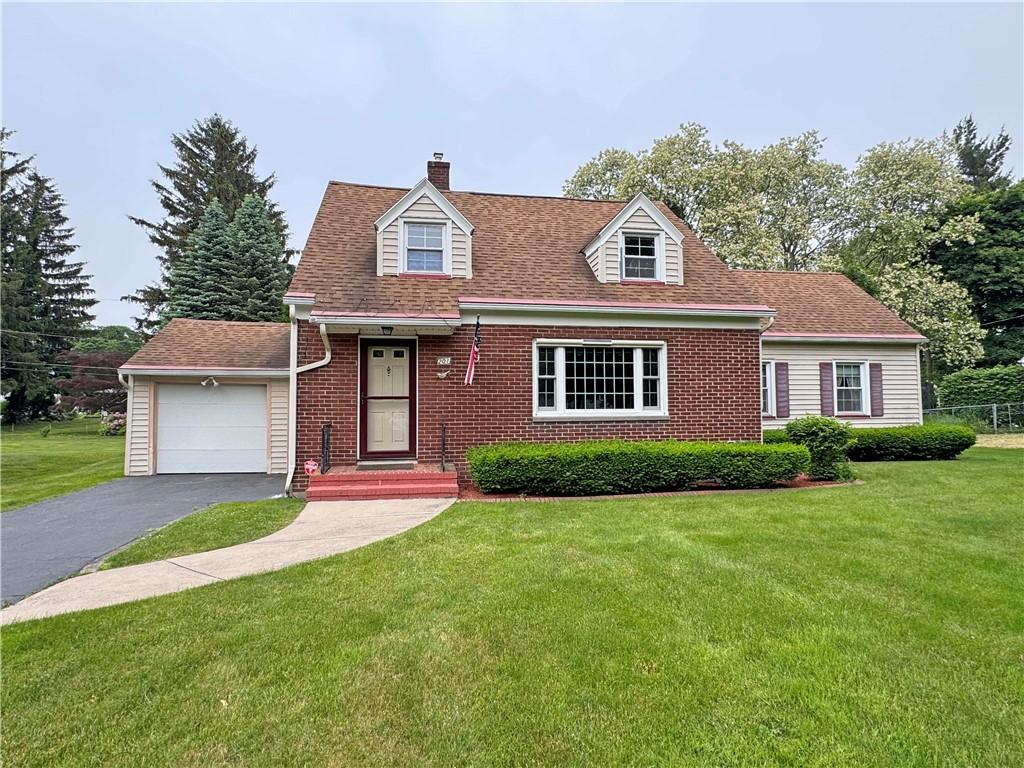 201 Ridgemont Dr, Greece, NY 14626 - cape cod home featuring a chimney, asphalt driveway, a front yard, and brick siding
