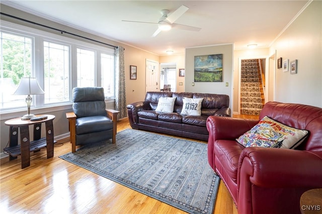 60 E Elizabeth St, Skaneateles, NY 13152 - living room with ornamental molding, wood finished floors, and a ceiling fan