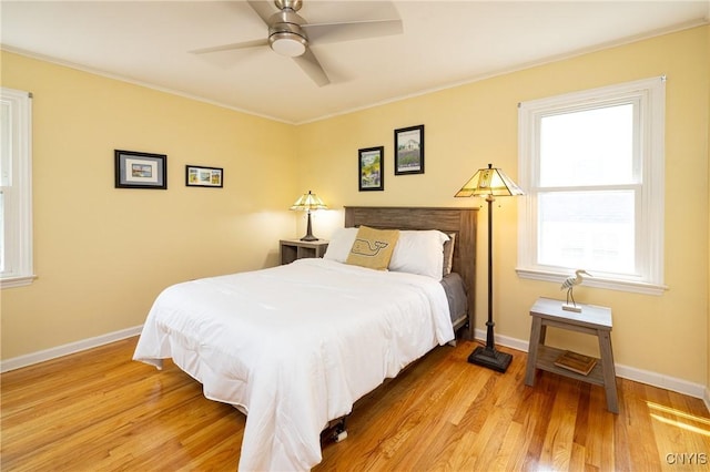 60 E Elizabeth St, Skaneateles, NY 13152 - bedroom with light wood-style floors, crown molding, and ceiling fan